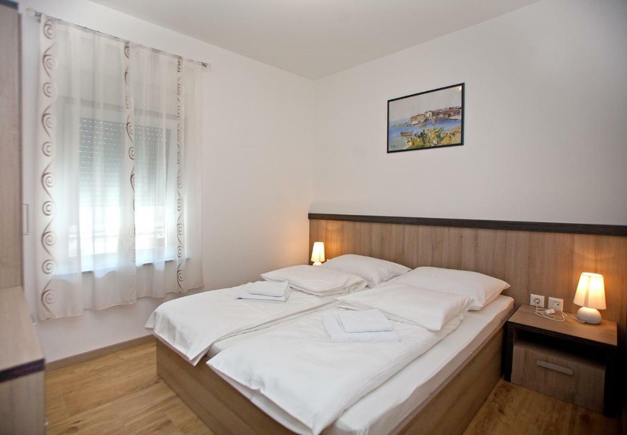 Apartments Maslina II Njivice Extérieur photo